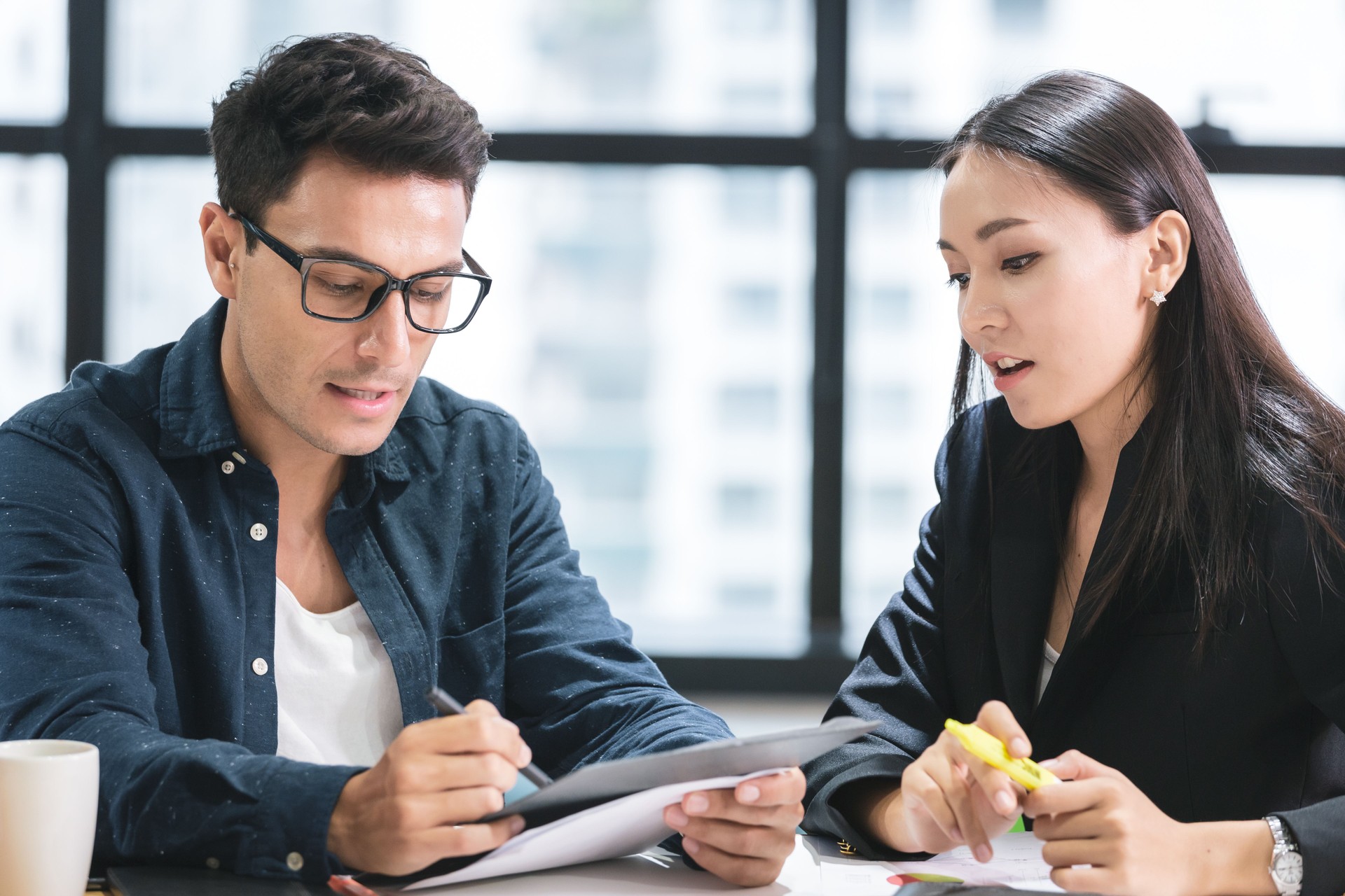 Business people with a team talking in office
